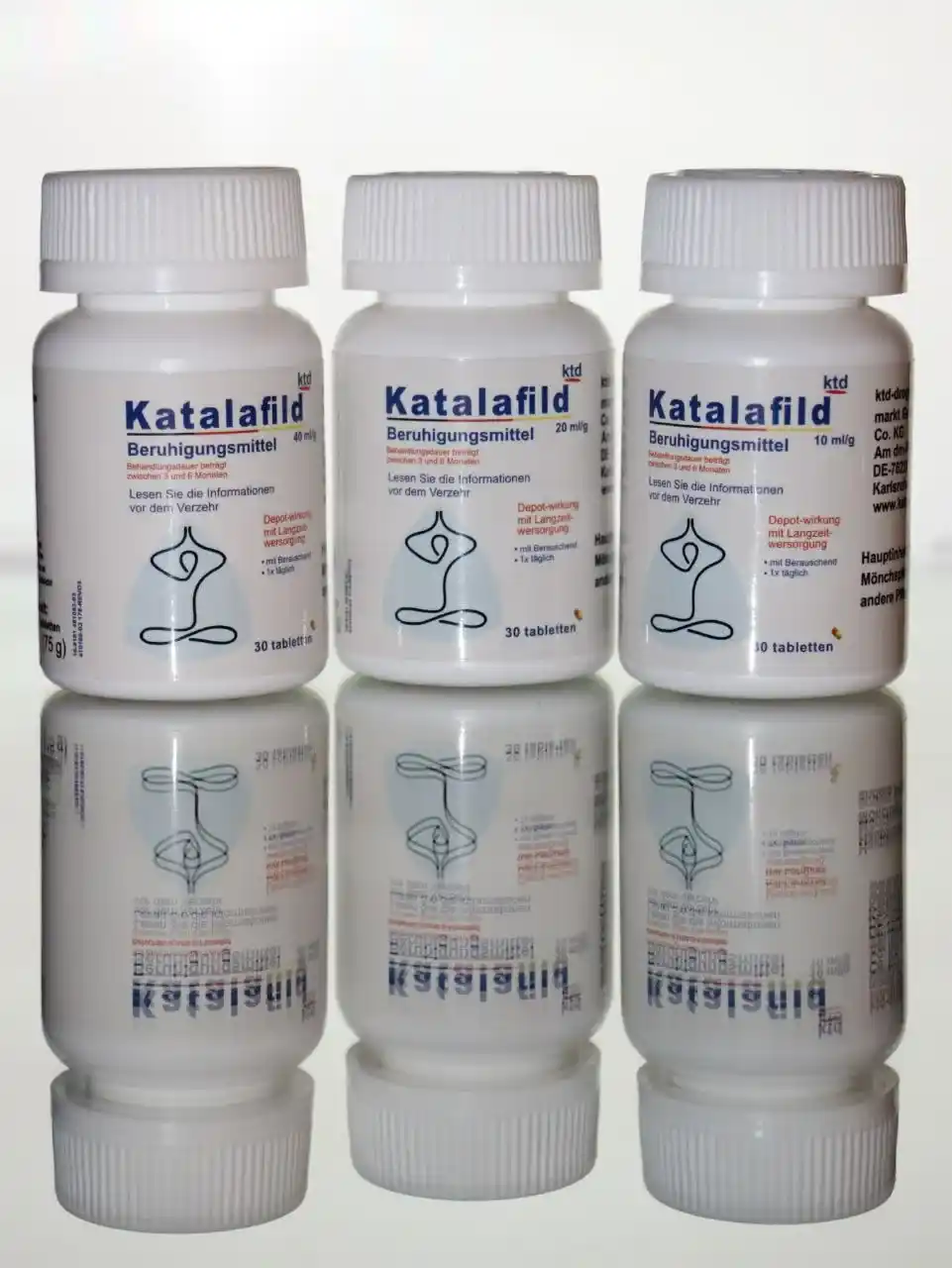 پک کامل کاتالافیلد هر سه دوز این محصول روی سطح شیشه ای